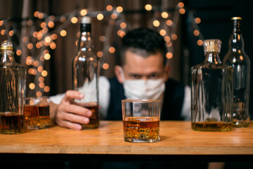 Whisky is poured into glass