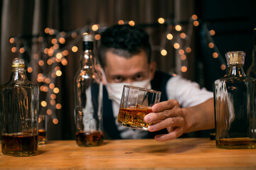 Whisky is poured into glass