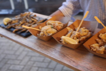 Fish, seafood. Fresh and fried fish cooked on the table