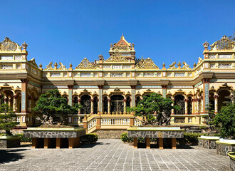 Beautiful Vietnamese Buddhist Vinh Trang Pagoda, mixture of Chinese, Vietnamese, Cambodian and European architectural styles  My Tho City, the Mekong Delta, Vietnam