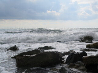 waves crashing on rocks