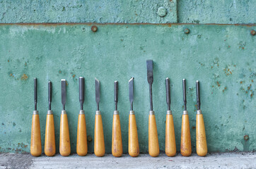 wood chisel set on a green background