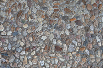 Pebble stones texture. Wash concrate covering texture. Surface of washbeton. Stony wallpaper. Beton pavement surface. Tumbledstones pattern. In german language: "Waschbeton". Cobble stone concrete.