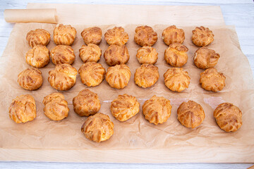 Cooking profiteroles on the table