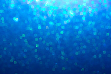 Blue bokeh. Abstract blue colorful background and texture