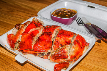Roasted duck in a foam container