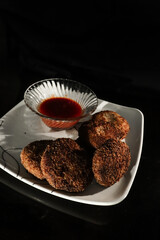 Indian homemade cutlets / snack with ketchup