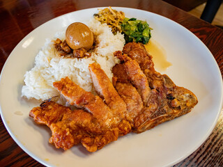 Close up shot of the Taiwanese style deep fried pork chop rice