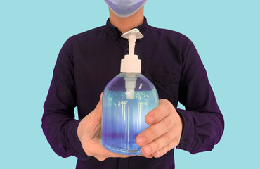 man holding a hand sanitizer gel.