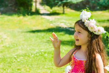 little girl with a bouquet of flowers
