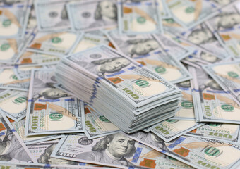 Stack of one hundred dollar bills close-up.