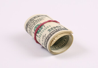 Money roll with US dollars.
