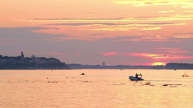 Beautiful sunset over Danube river in Belgrade capital of Serbia with Zemun municipality in the background