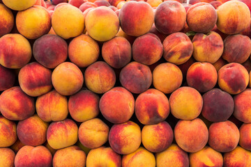 Fresh organic peach on market.