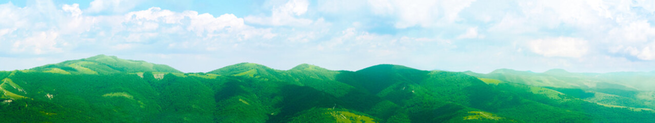 Mountain range panoramic landscape. Forested mountains, summer day, view on National nature park