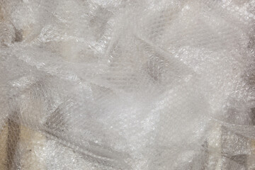 Bubble wrap on the wooden floor.
