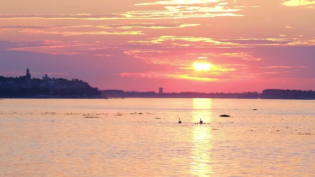 Beautiful sunset over Danube river in Belgrade capital of Serbia with Zemun municipality in the background
