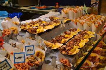 
products on the counter of the barcelona market