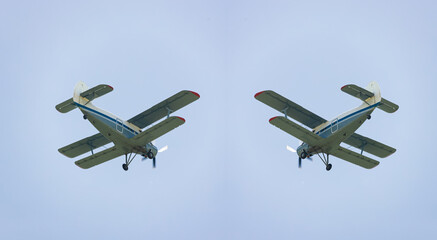 Light-engine propeller aircraft an-2 flying in the sky. View from the ground