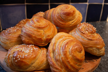 Freshly baked Turkish pogaca pastries.