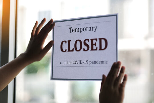 Closed Businesses For COVID-19 Pandemic Outbreak, Closure Sign On Retail Store Window Banner Background. Government Shutdown Of Restaurants, Shopping Stores, Non Essential Services.