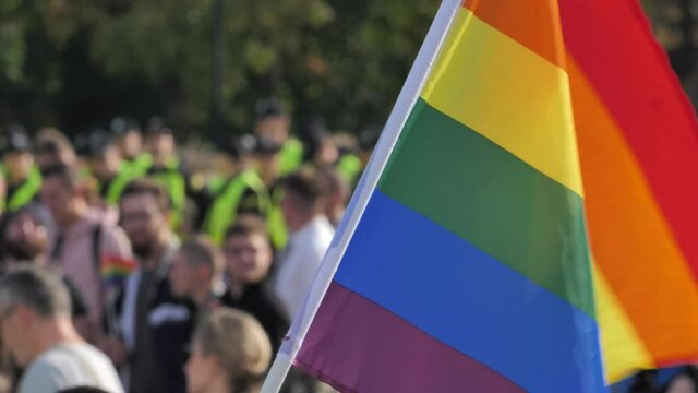 Rainbow Flag LGBTQ blur crowd in background