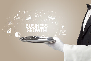 Waiter serving business idea concept with BUSINESS GROWTH inscription