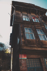old abandoned wooden house at the city
