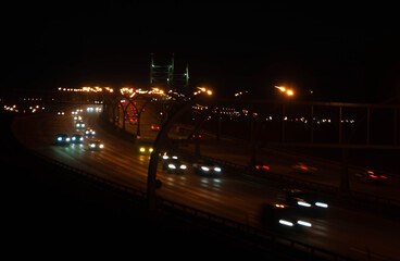 Night traffic highway. City road. Evening motorway.  Cars on a roadway in the dark. Western high-speed diameter, Saint Petersburg, Russia.