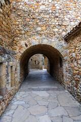Fototapeta premium Castle de Pals, historic stone walls and arches, Pals, Spain