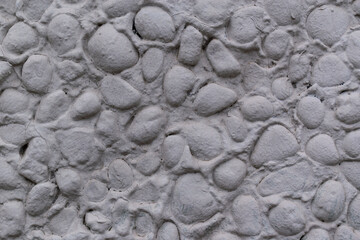 Wall of stones painted with paint for backdrop. Color Gray Suit, Hue Blue.