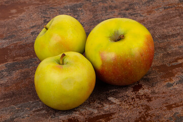 Ripe apples over background