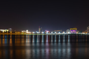 Fototapeta na wymiar night city in the reflection of the river