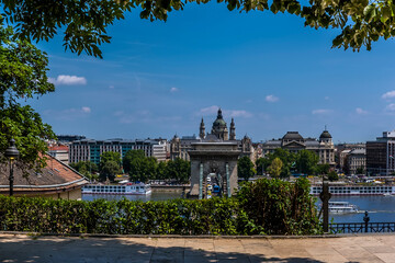 Fototapeta na wymiar A view across the River Danube and the Chain Bridge in Budapest in summertime