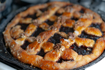 Ready sweet cake with jam and nuts