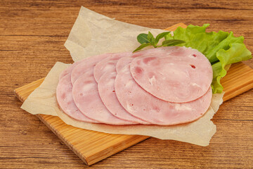 Slised ham snack over board