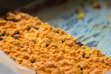 Delicious sweet homemade pastries with pieces of fruit. Shallow focus