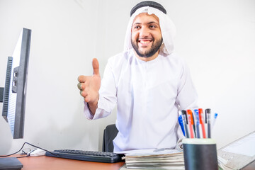 Arabic muslim manager standing to weclome his guest