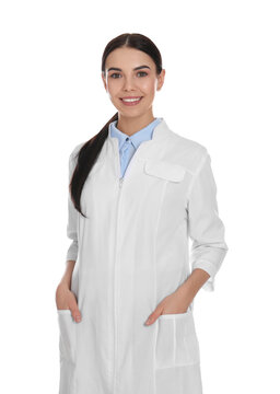 Happy Young Woman In Lab Coat On White Background