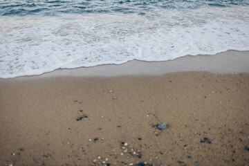 A sign on a beach