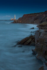 Fototapeta na wymiar lighthouse on the rocks