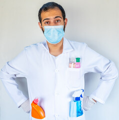 Arabic muslim, doctor holding many hygiene products