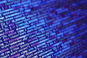 Software developer programming code. Abstract modern virtual computer script. Work of software developer programmer on desktop screen closeup