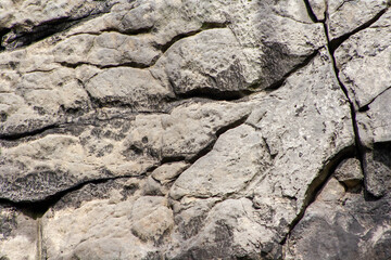 close up of a grey stone wall