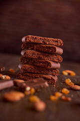 Chocolate cakes stacked on a wooden table