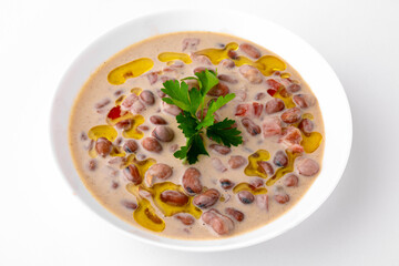 Boiled Beans with Sauce. A dish for delivery, or an online store. Isolated on a white background.