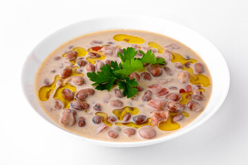 Boiled Beans with Sauce. A dish for delivery, or an online store. Isolated on a white background.