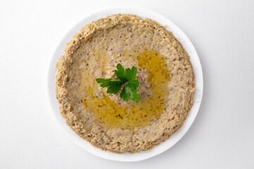 Eggplant caviar. A dish for delivery, or an online store. Isolated on a white background.