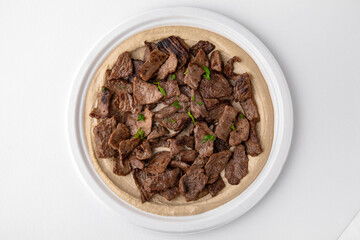 Hummus with beef . A dish of crushed chickpeas for delivery, or  online store. Isolated on a white background.