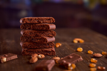 Chocolate cakes stacked on a wooden table